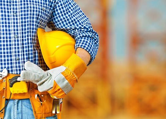 Man Holding On A Hard Hat — Marlton NJ — Borbi Clancy & Patrizi LLC Man Holding On A Hard Hat — Marlton NJ — Borbi Clancy & Patrizi LLC