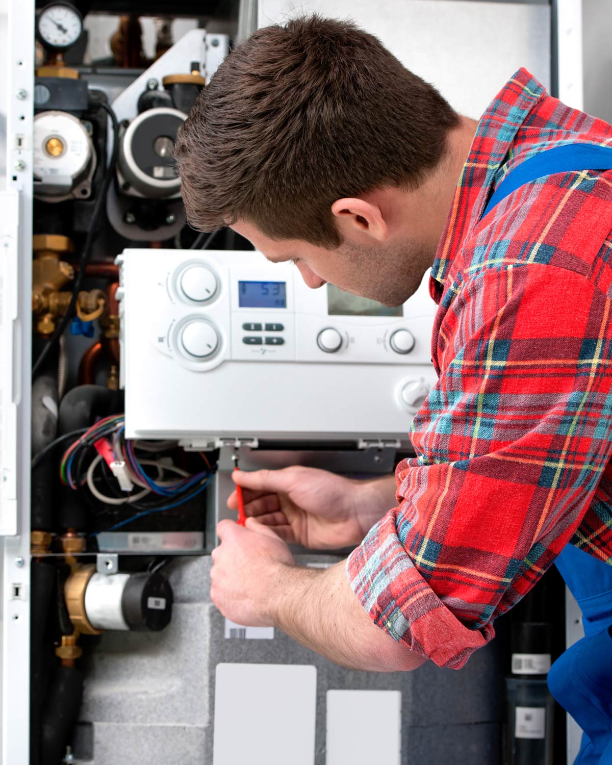 Man Repairing AC — Brazil, Indiana — Clay County Furnace Man Repairing AC — Brazil, Indiana — Clay County Furnace