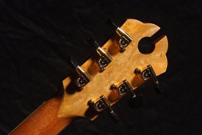 Headstock rear Fingerstyle Artist model in MonkeyPod and Engelmann