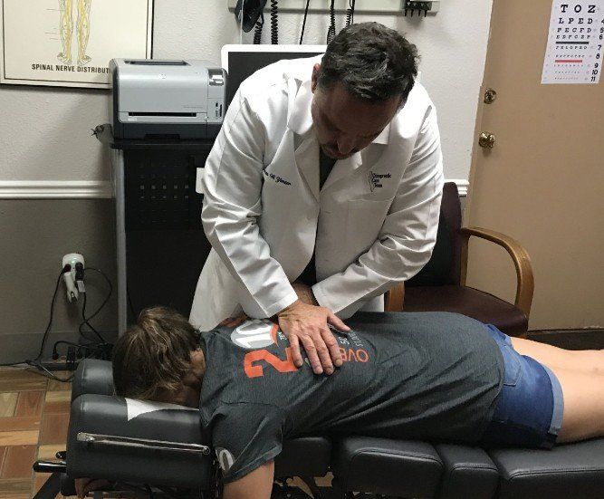 Dr Yenzer Chiropractic adjustment