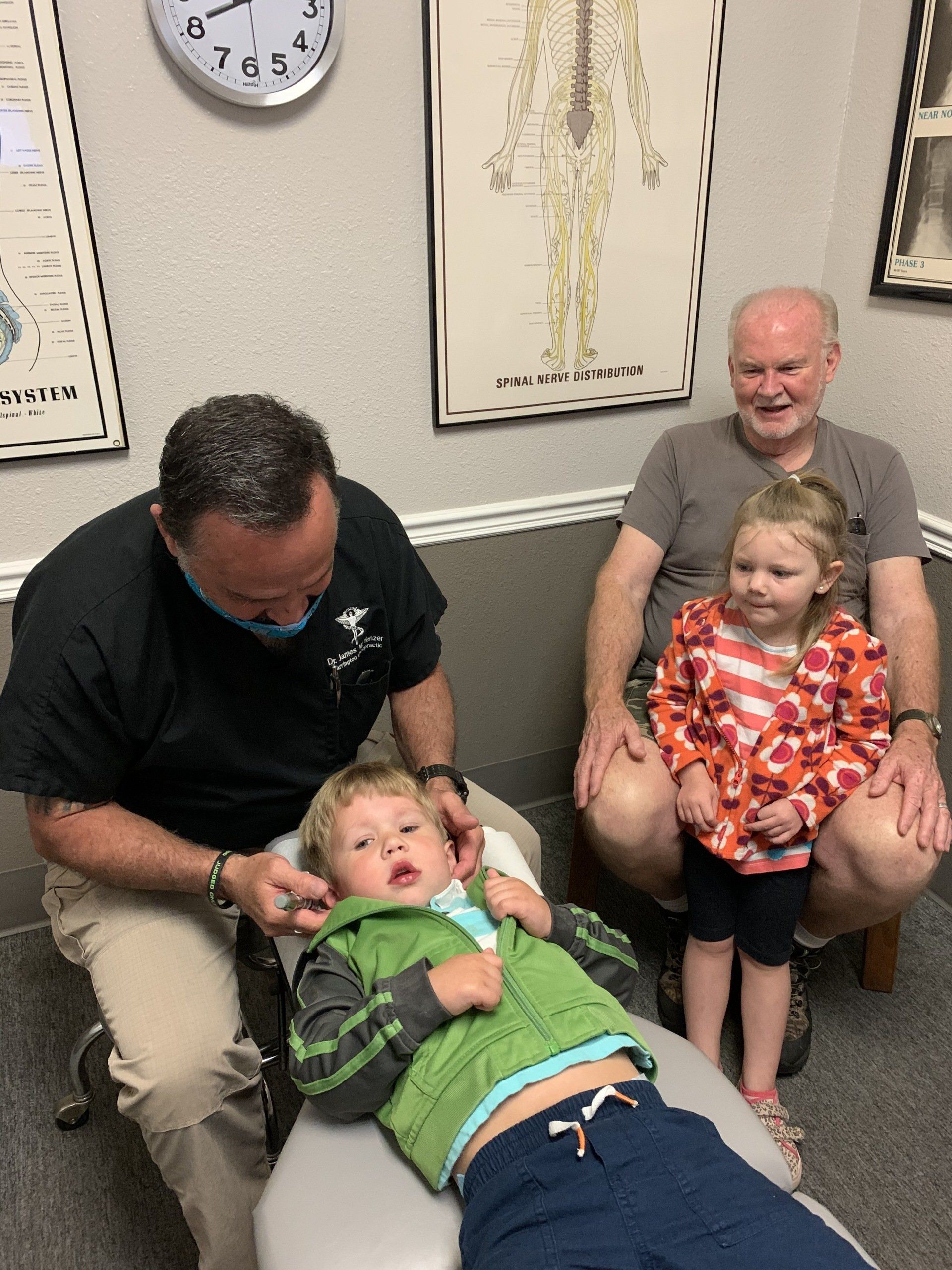 Dr Yenzer Chiropractic adjustment of a child