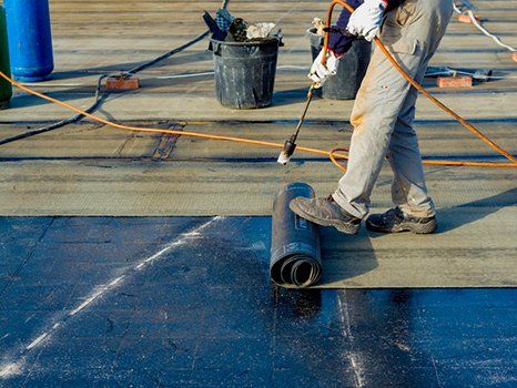Flat Roof Coating ─ Roofing Felt Roll For Melting By Gas Heater in Tucson, AZ Flat Roof Coating ─ Roofing Felt Roll For Melting By Gas Heater in Tucson, AZ