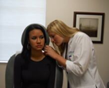 Patient getting checked - Services in Bradenton, FL