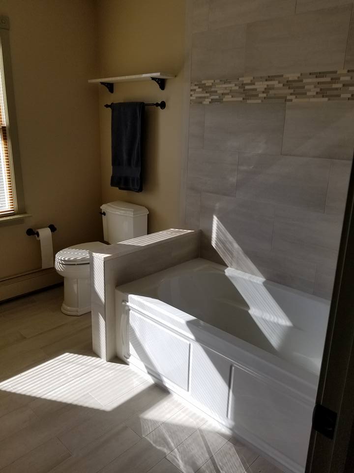 Plumbing Leak — Plumber Cleaning Clogged Sink Pipe in Hillsborough, NJ