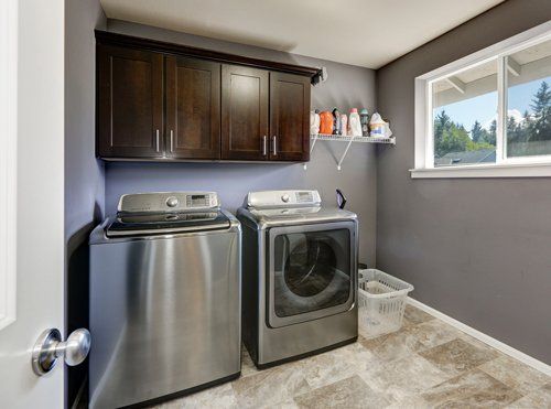 Interior Remodeling — Grey Laundry Room with Modern Appliances in Hillsborough, NJ Interior Remodeling — Grey Laundry Room with Modern Appliances in Hillsborough, NJ