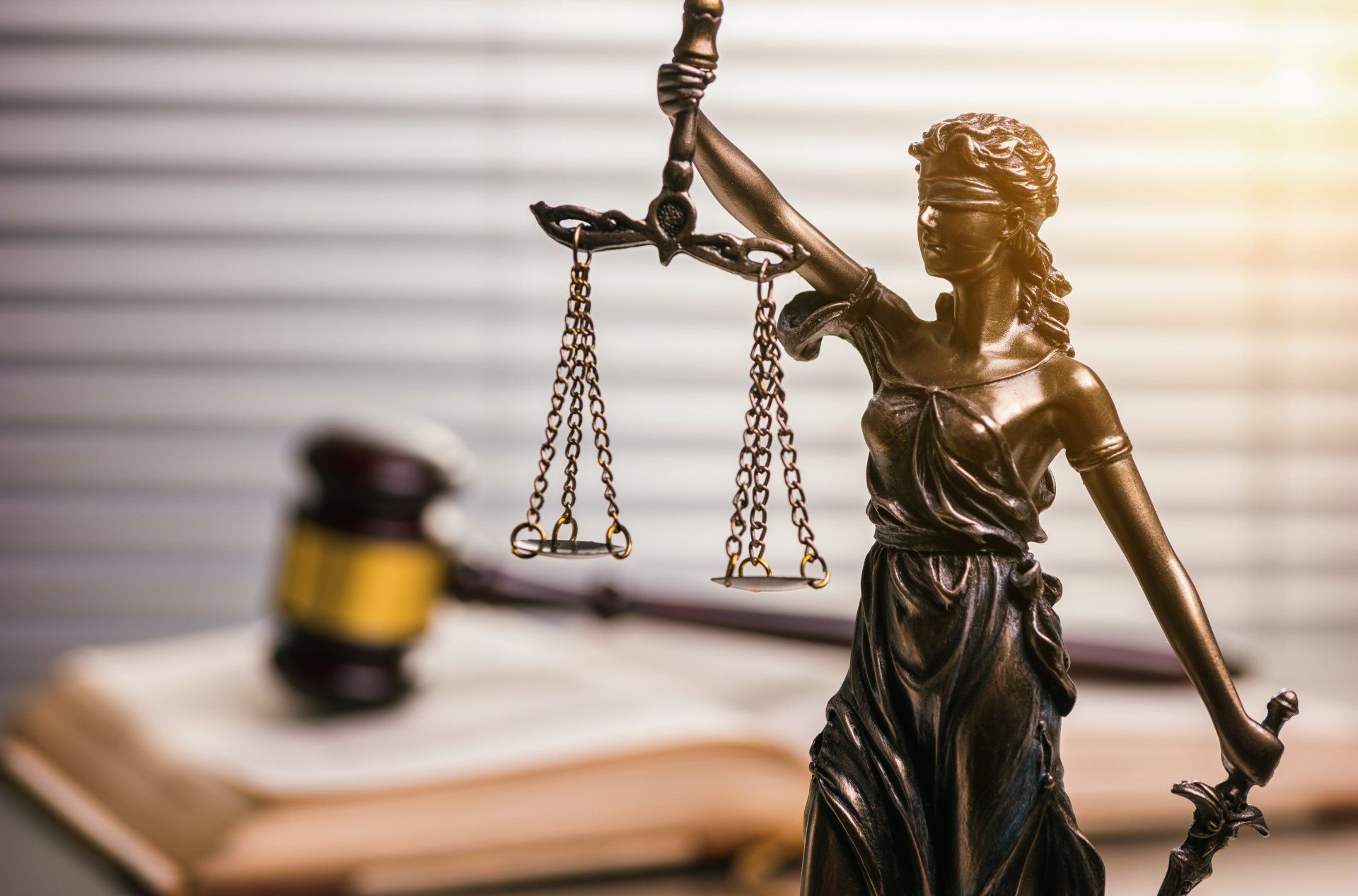 Judge's Gavel with Statue of justice
