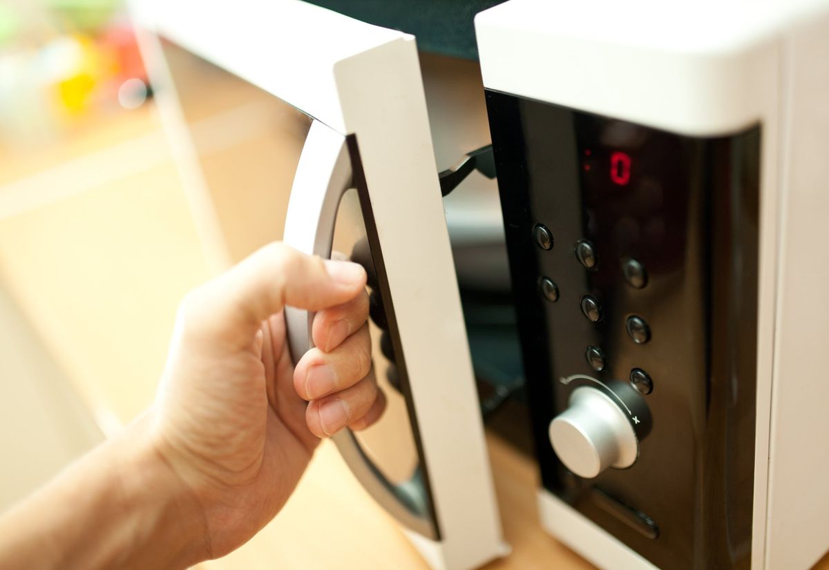 Fix Oven — Hand Holding and Opening Oven in Hampton Roads, VA Fix Oven — Hand Holding and Opening Oven in Hampton Roads, VA