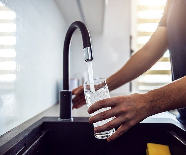 Clean Water From Faucet — Green Valley, IL — Derek Bell Plumbing Clean Water From Faucet — Green Valley, IL — Derek Bell Plumbing