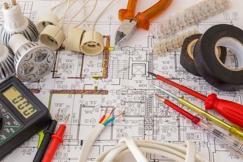 Electrical components arranged on a house plan