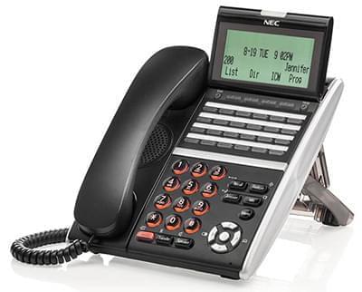 A black and silver telephone with a screen on top of it.