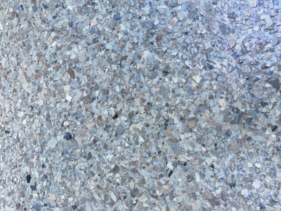 Pumice flake color sample for polyaspartic garage flooring