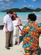 John Verrico Officiates Wedding on Beach in Bright Orange Suit