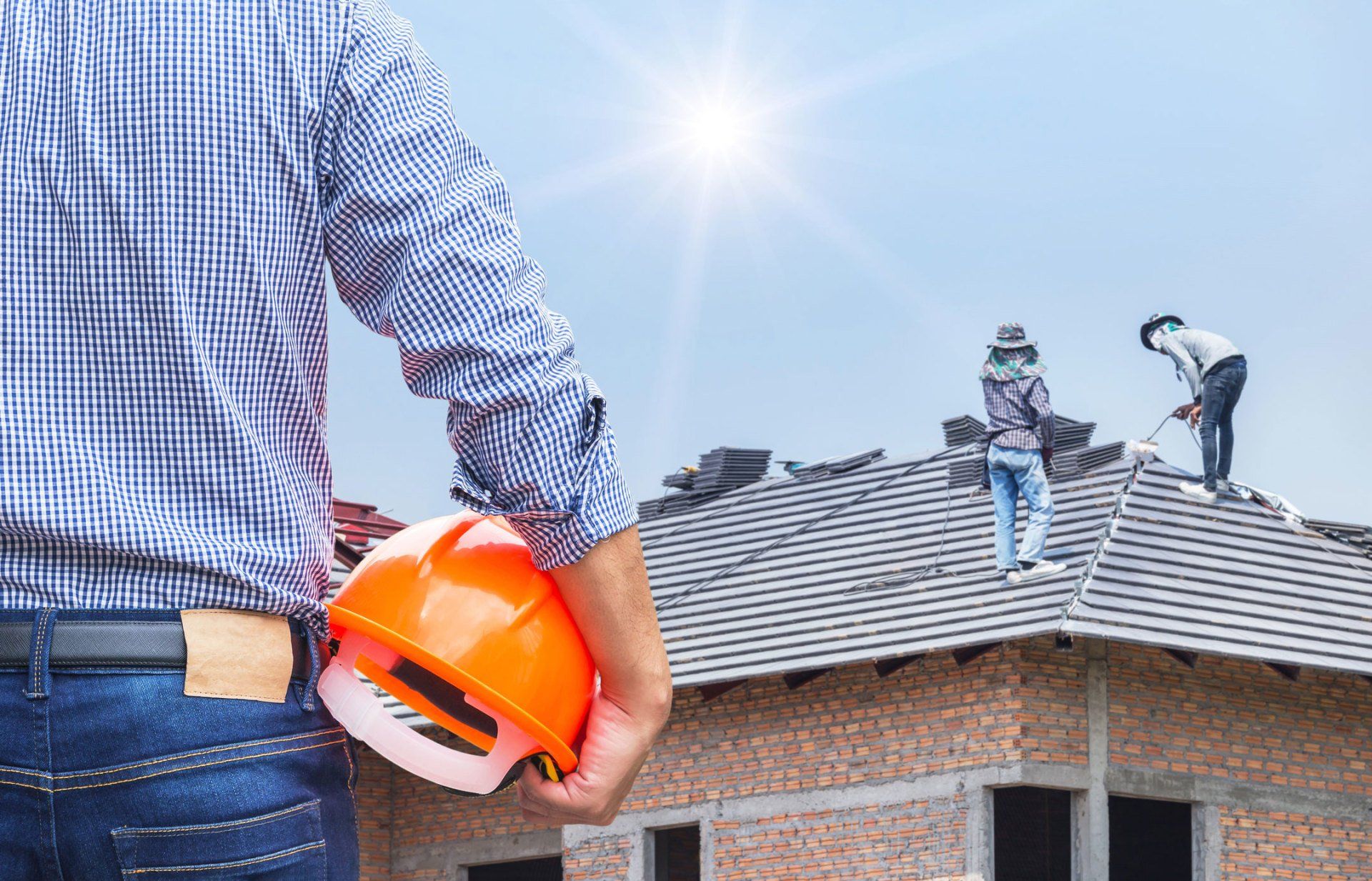 Engineer Checking the Roofer Workers — Millersville, MD — Dynamic General Contracting