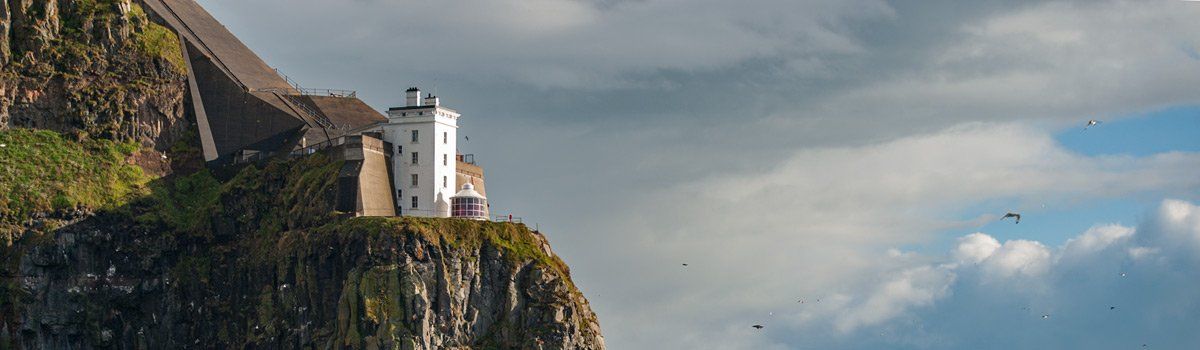 Photo - West Light Rathlin by Art Ward