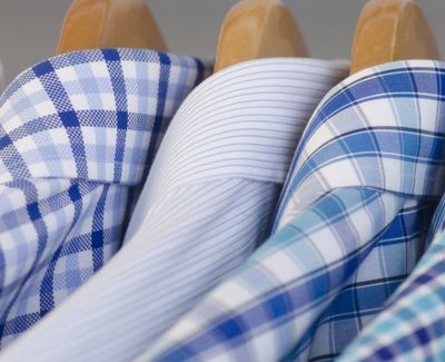 shirts on wooden hangers