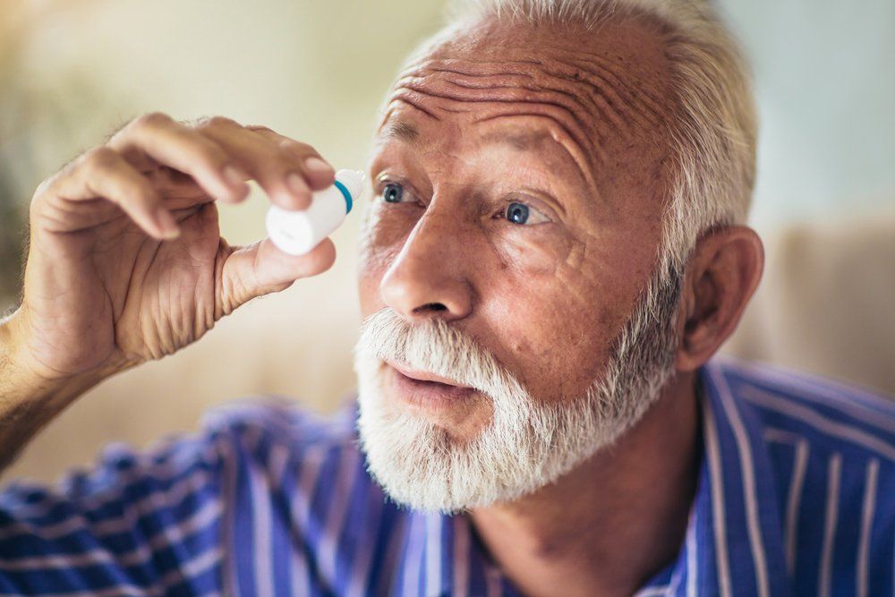 Man with Eye Drops — Big Rapids, MI — Crew & Boss Eye Associates