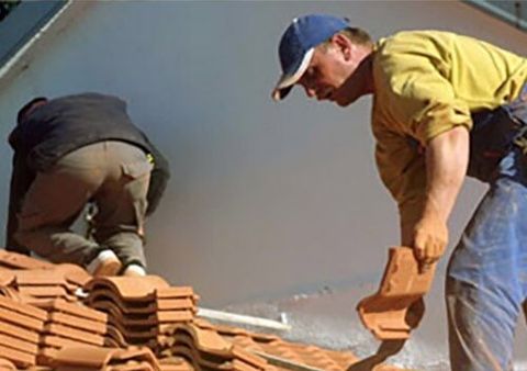 Two Man's Installing the Roof — Roofing Services in Dr. Santa Maria, CA Two Man's Installing the Roof — Roofing Services in Dr. Santa Maria, CA
