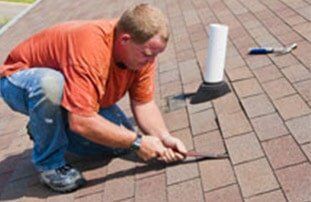 Man Roof Patching — Roofing Services in Dr. Santa Maria, CA Man Roof Patching — Roofing Services in Dr. Santa Maria, CA
