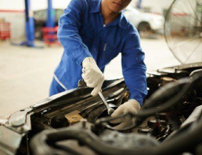 Mechanic Fixing the Car Engine — Willow Grove, PA — Terwood Auto Repair Mechanic Fixing the Car Engine — Willow Grove, PA — Terwood Auto Repair