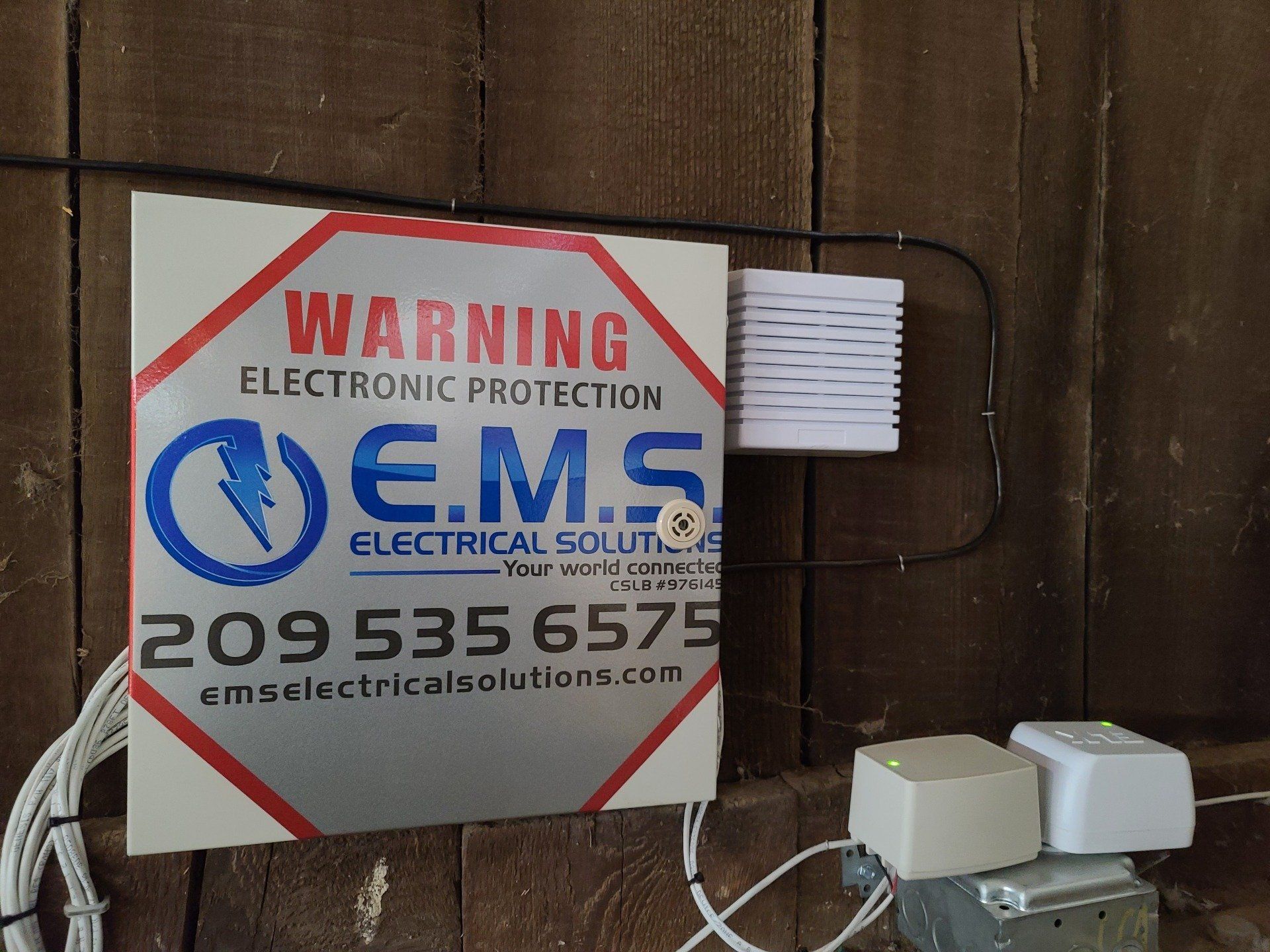 A sign that says warning electronic protection on it