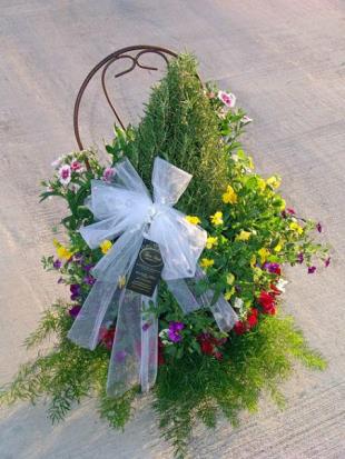 Beau Monde installed floral arrangement in a metal heart-shaped basket. Lafayette, LA