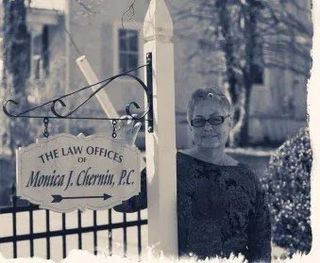 Monica Cherin Standing beside her Signage — Culpeper, VA — Law Offices of Monica J Chernin Monica Cherin Standing beside her Signage — Culpeper, VA — Law Offices of Monica J Chernin
