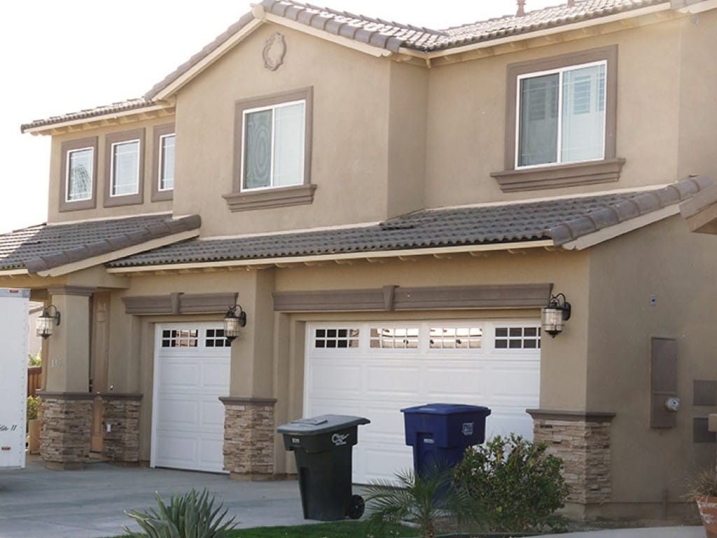 House with Two White Garage Doors — Imperial, CA — NS Construction