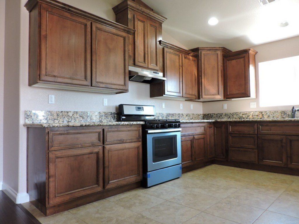 Kitchen with Hanging Wooden Cabinet — Imperial, CA — NS Construction