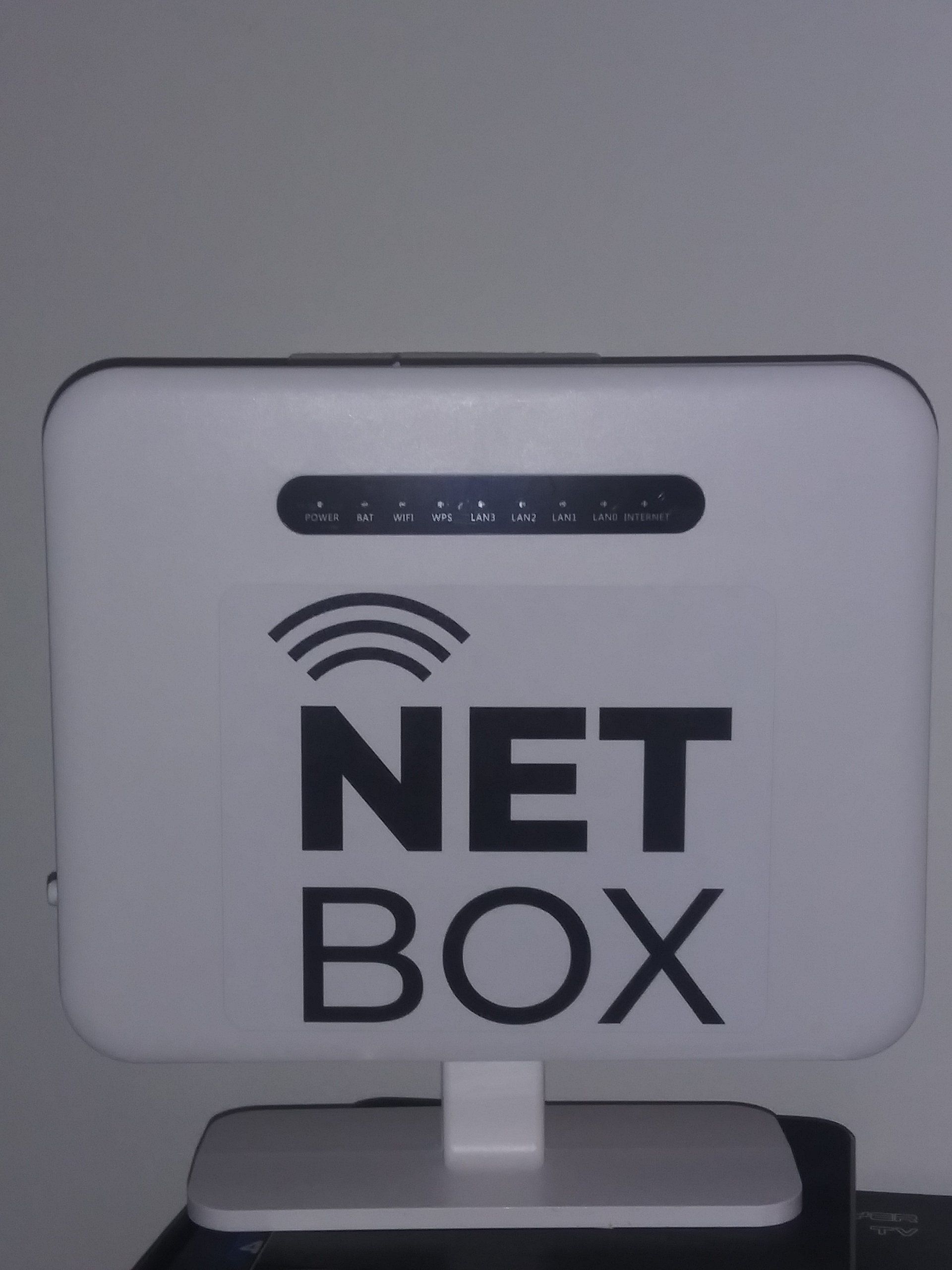 A white net box is sitting on a table