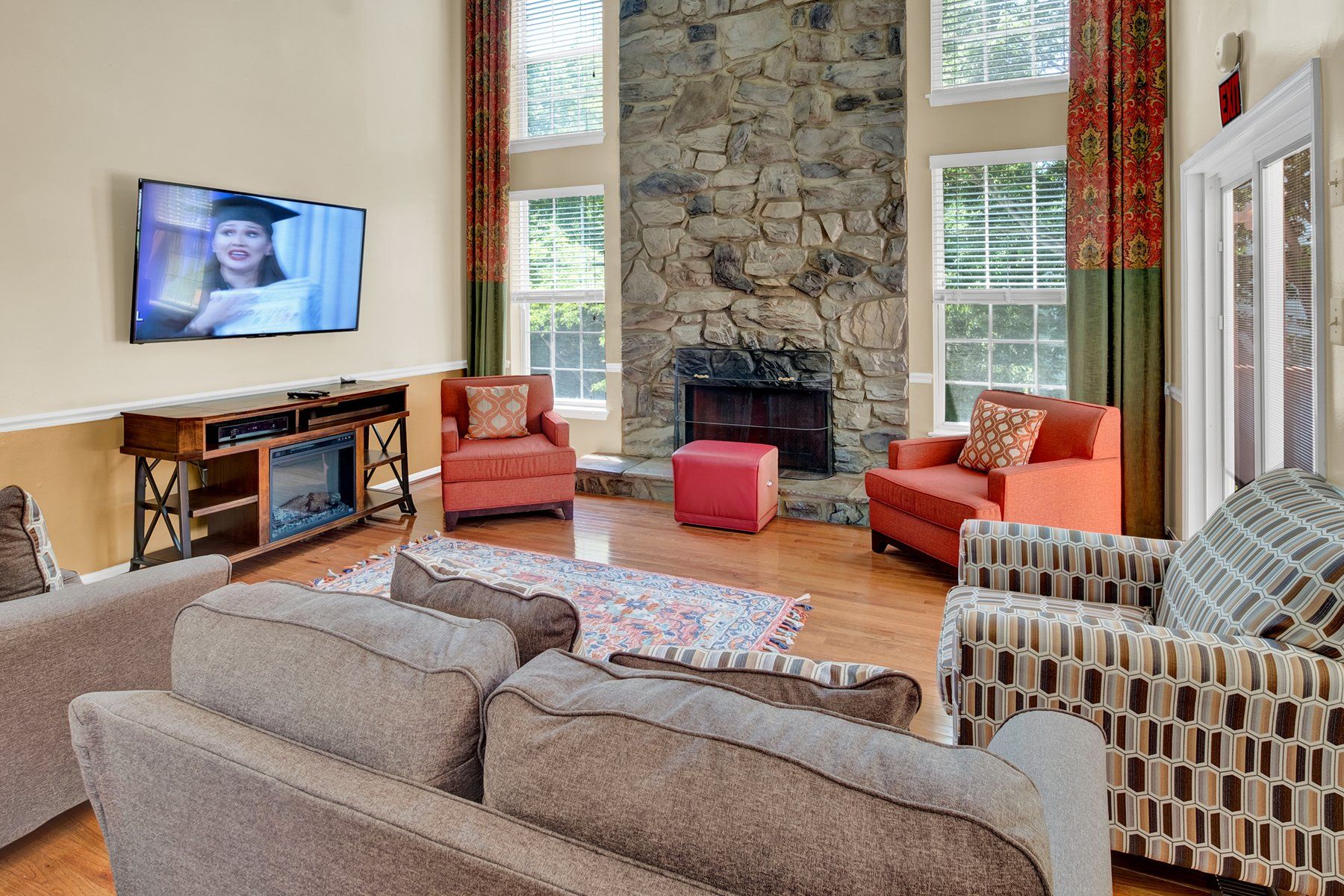 A living room filled with furniture and a fireplace.