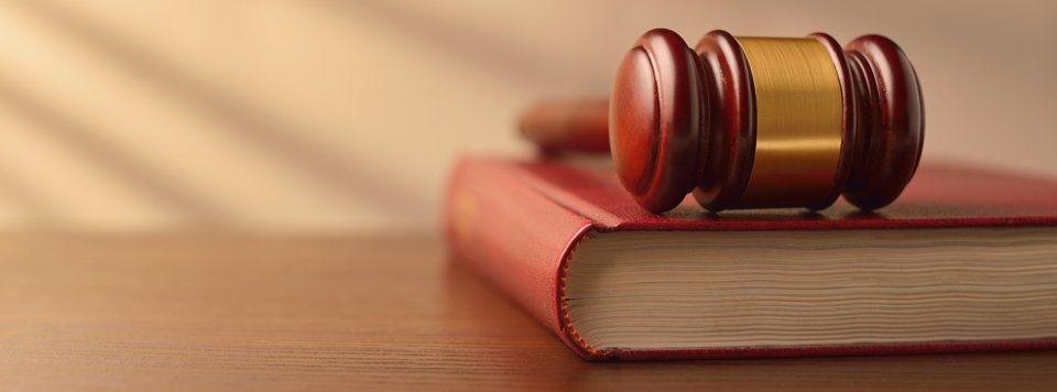 Law book and judges gavel