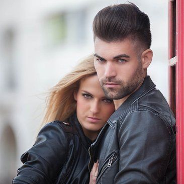 A man and woman posing