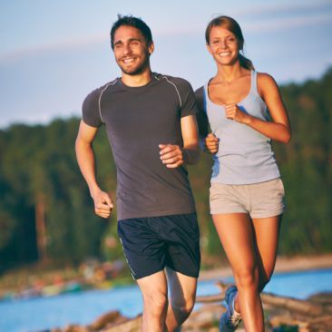 A man and a woman running