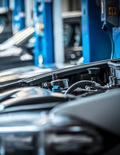 Car On Garage — Exton, PA — Longley Insurance Agency