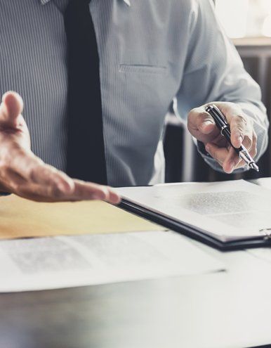 Man Discussing Insurance Policy — Exton, PA — Longley Insurance Agency