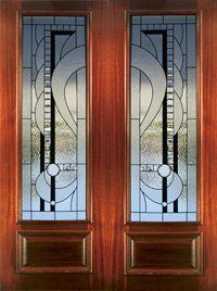 Wooden double doors with frosted geometric glass panels in blue, gray, and white.