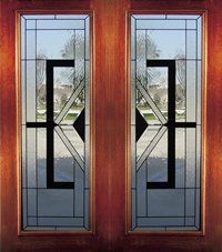 Wooden-framed double glass doors with geometric black metal designs