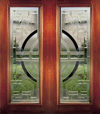 Wooden double doors with frosted glass panels and a black circular design