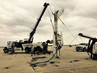 Tow truck service helping with aircraft recovery in San Angelo, TX