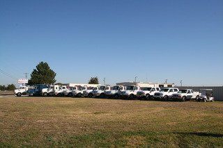 A line of Home Motors, Inc fleet vehicles in Big Lake, TX