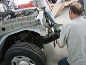 image-72252-02D22872.jpg?1410464811485 A person doing auto body repair near Athens, GA
