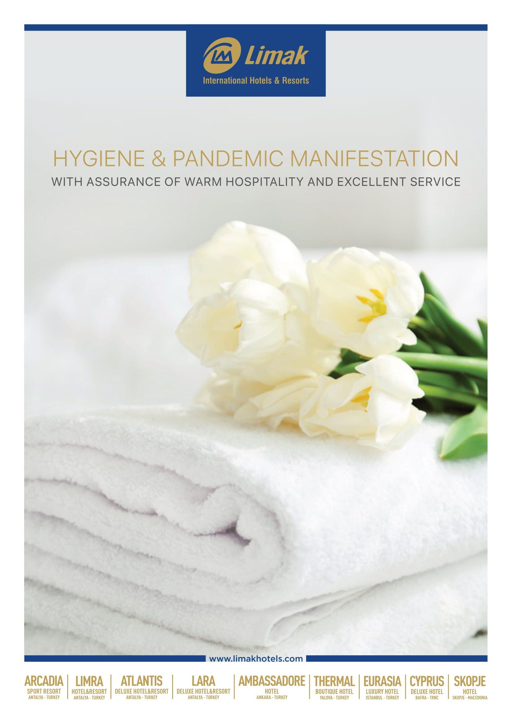 A white towel with a bunch of white flowers on it