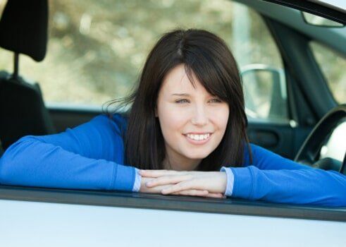 Woman in Car — Essential Homeowners and Car Insurance in Temecula, CA Woman in Car — Essential Homeowners and Car Insurance in Temecula, CA