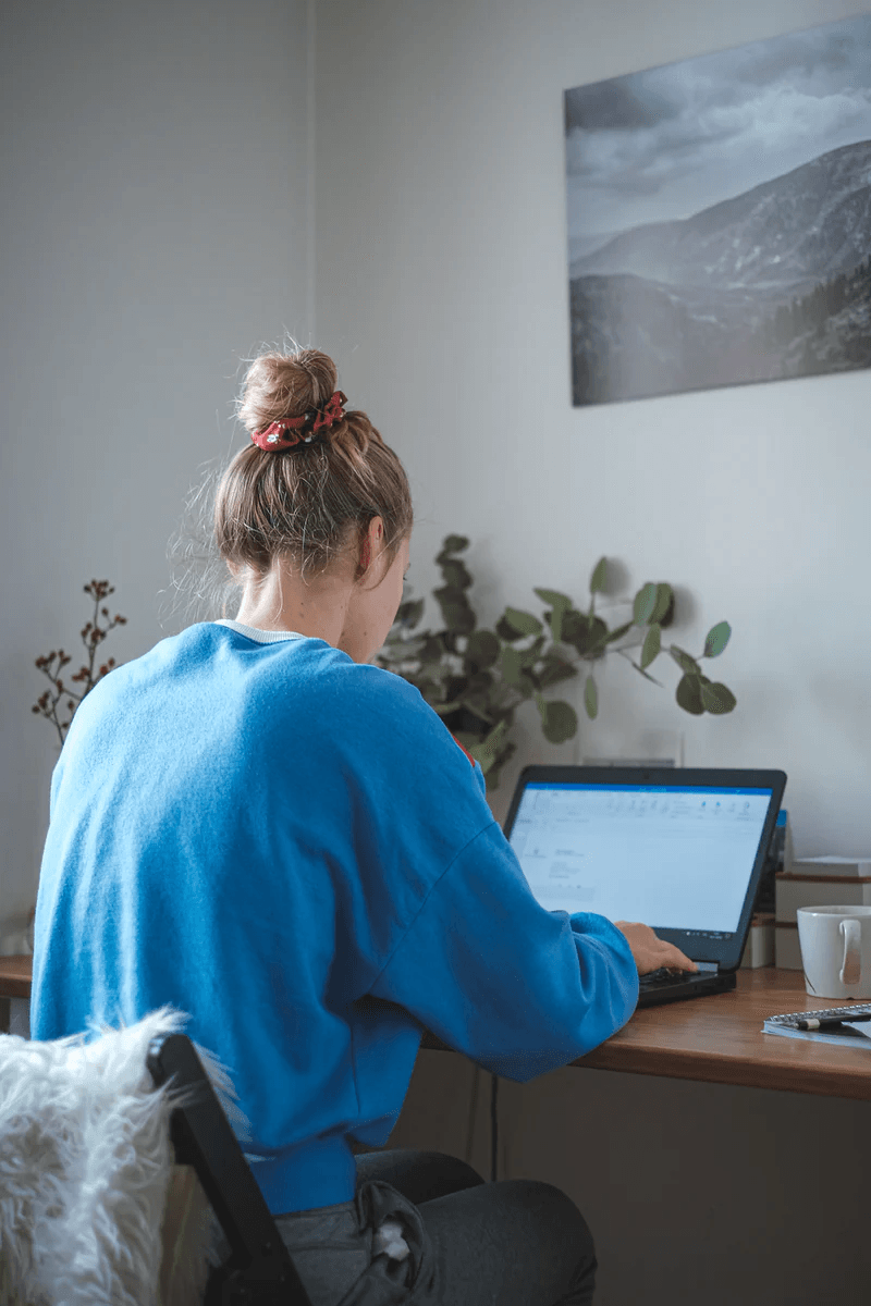 Girl typing on laptop