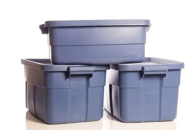 Three blue plastic storage bins stacked, with lids.