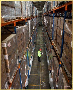 For rapid and reliable haulage services in Wisbech call Fenland Haulage & Storage Storage container filled with brown boxes
