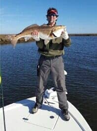 Carpet Restoration — Man Holding a Fish in Hattiesburg, MS Carpet Restoration — Man Holding a Fish in Hattiesburg, MS