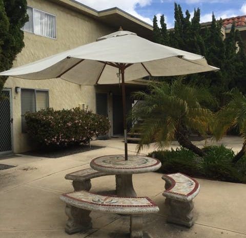 Patio with a concrete table and seating