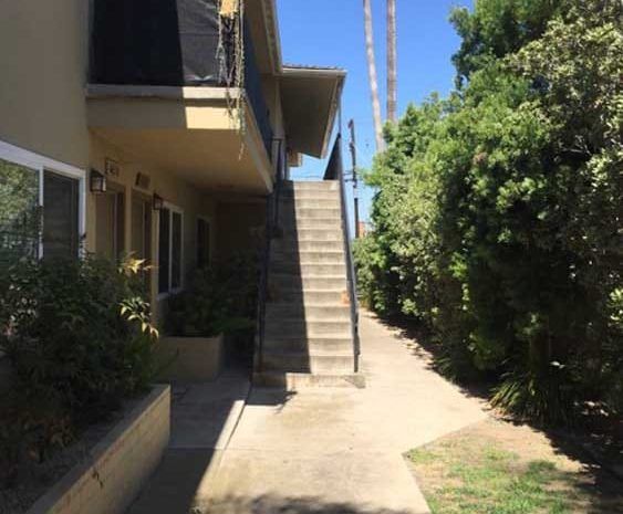 Stairs leading up to second level of apartment complex