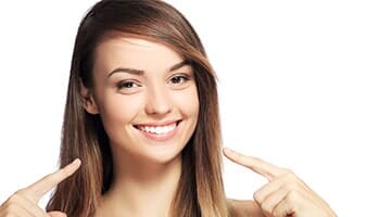 Girl Showing Her White Teeth — Bleaching - Tooth Whitening in Fort Walton Beach, FL Girl Showing Her White Teeth — Bleaching - Tooth Whitening in Fort Walton Beach, FL